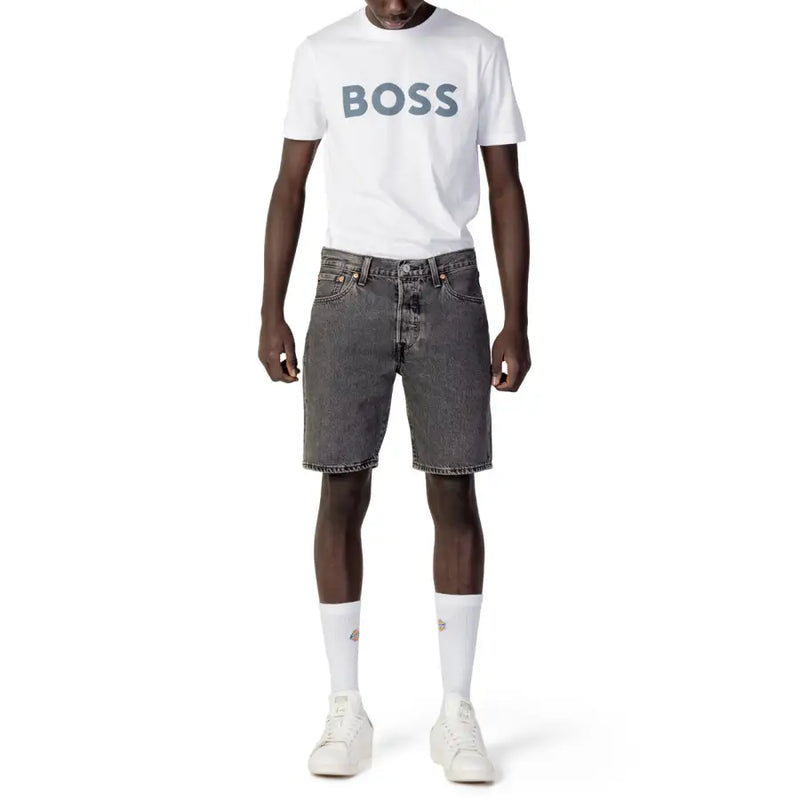 Levis men’s black cotton shorts paired with a white boss t-shirt featuring a gray logo for spring and summer