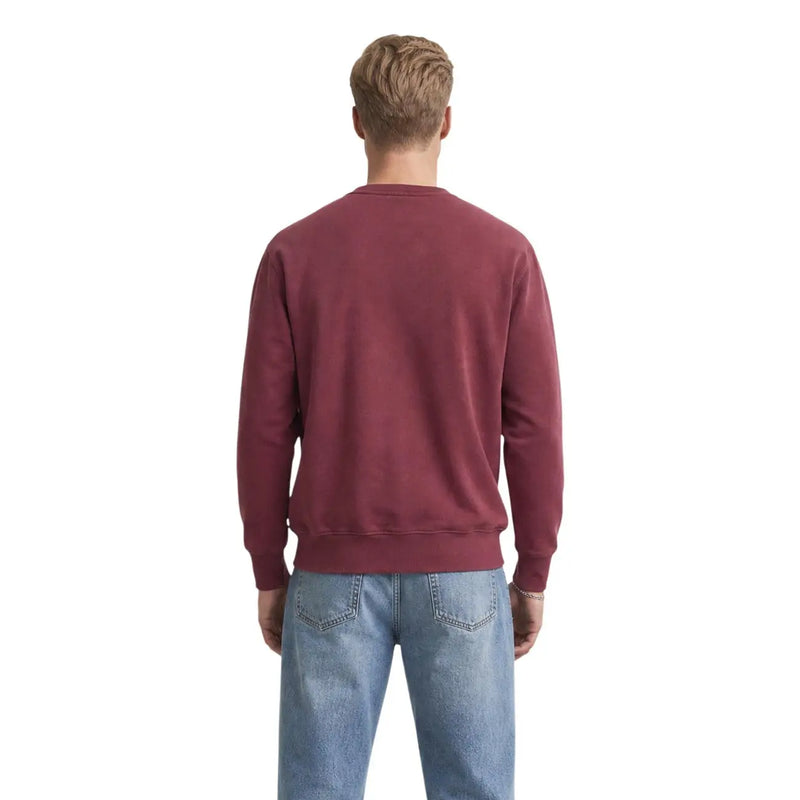 Levi's Herren-Sweatshirt aus bordeauxroter Baumwolle mit Rundhalsausschnitt und gerippten Bündchen an Ärmeln und Saum.