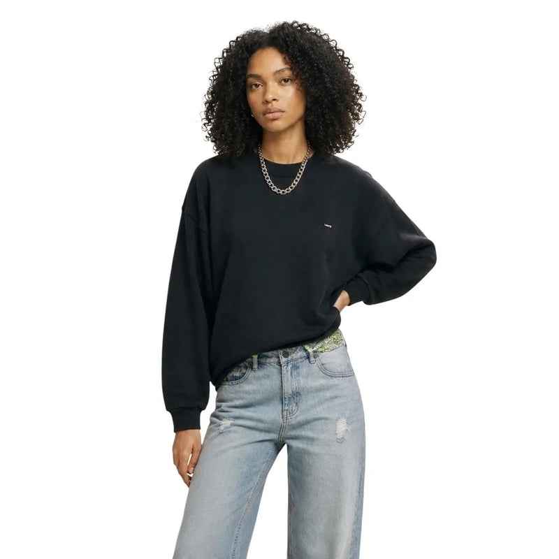 Levis women black cotton oversized crewneck sweatshirt with a small embroidered logo on the left chest