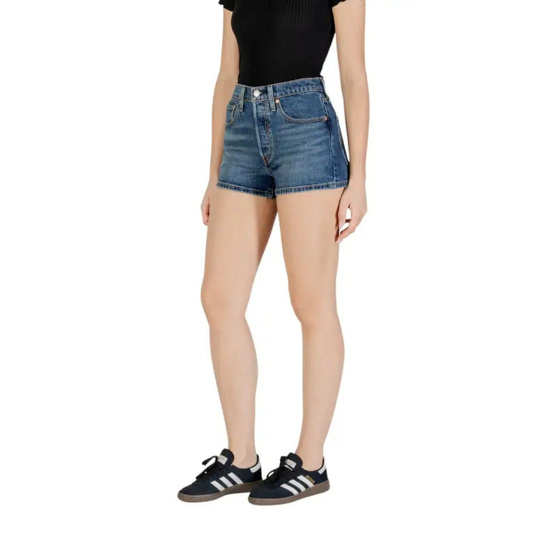 Women wearing Levis Blue Cotton Blend Fall Winter Shorts with mid-wash denim and black sneakers