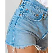 Levis Women Light Blue Cotton Shorts featuring light-wash denim, frayed hems, and bronze rivets