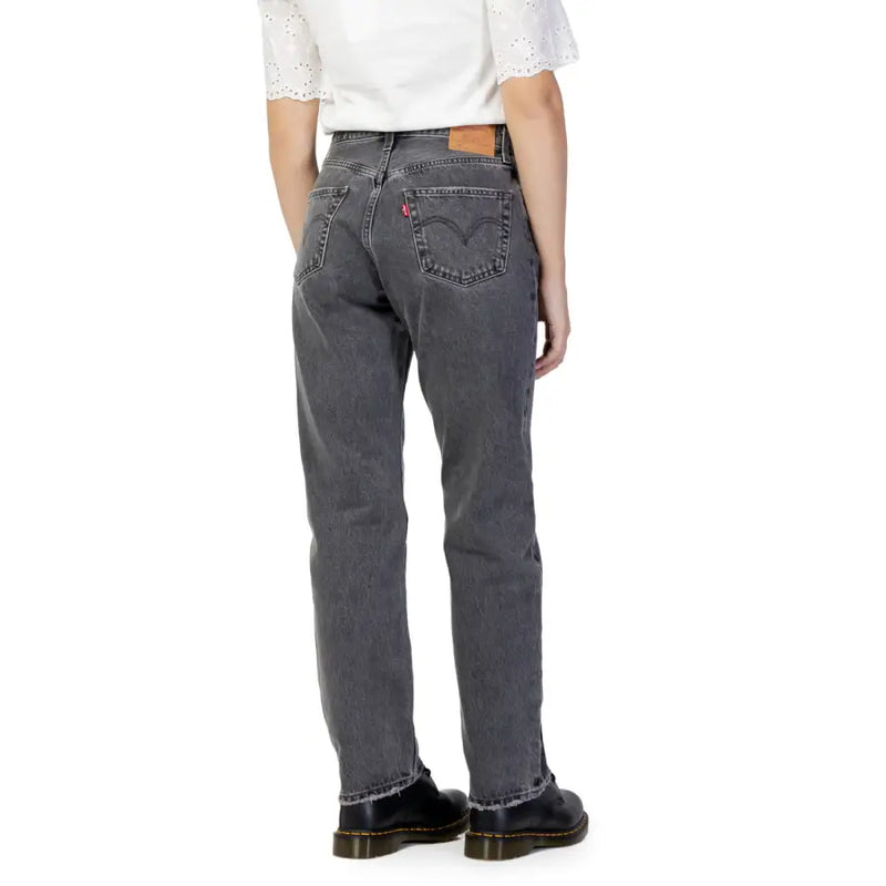 Levi’s women’s black jeans in dark gray 100 percent cotton with classic five-pocket design and frayed cuffs