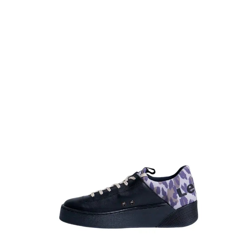 Levis women’s black leather platform sneaker with white laces and purple gray leopard print accent on the heel back side