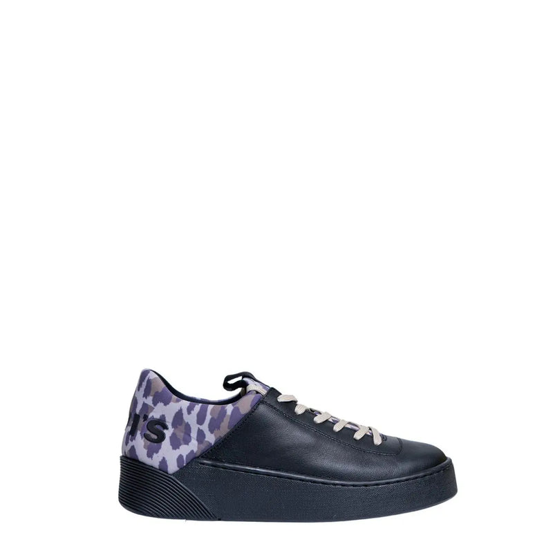 Levi’s women’s black leather sneakers shown from back with purple and gray leopard print accent on heel tab