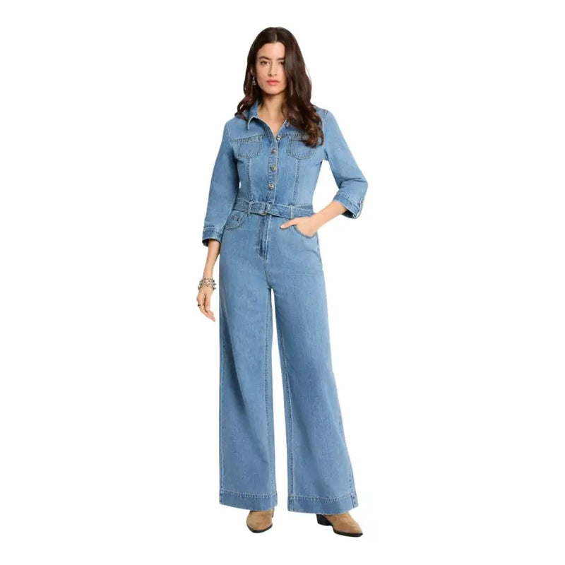 Light blue light-wash denim jumpsuit with button-up front belted waist pockets and three quarter sleeves