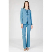 Light blue Rinascimento women pantsuit featuring single-button blazer and flared trousers