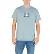 Light blue Calvin Klein T shirt displayed in the product listing, ideal for casual wear