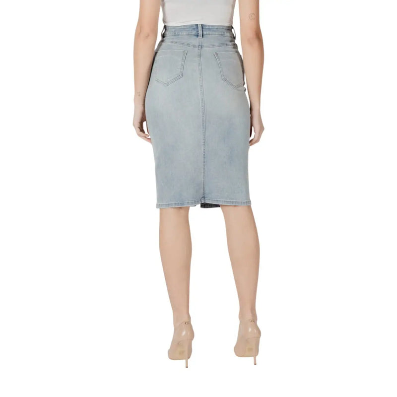 Light blue cotton blend light-wash denim pencil skirt with a high waist and back pockets shown from the back side