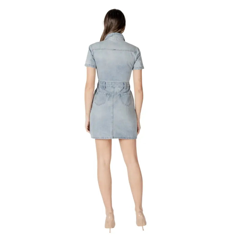 Light blue cotton light-wash denim mini dress with short sleeves collar button front v neck and pockets