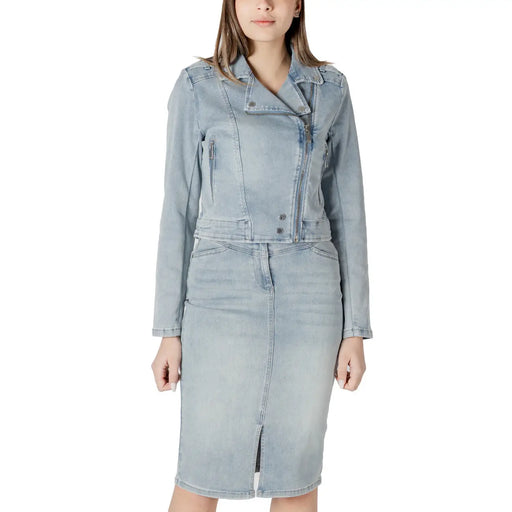 Light-wash denim moto jacket with zipper front, buttons, side zip, pockets