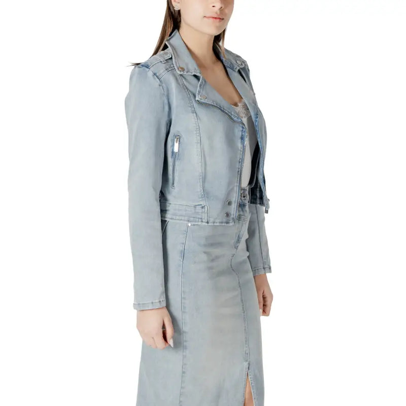 Light blue cotton denim moto jacket with silver zippers buttons side zip and pockets for casual wear