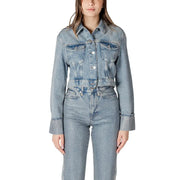 Light blue denim jacket with light-wash fabric, classic collar, button-front closure, and two chest pockets