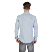 Light blue long-sleeved shirt displayed as product named Light Blue Long Sleeved Shirt