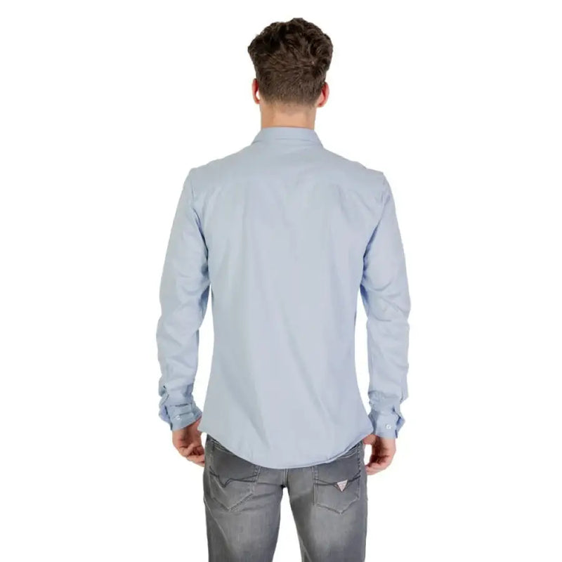 Light blue long-sleeved shirt displayed as product named Light Blue Long Sleeved Shirt
