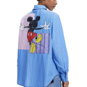 Light blue pinstripe women’s button-up shirt with Mickey Mouse graphic on the back