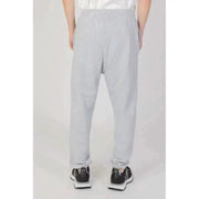 Light gray sweatpants paired with black sneakers Underclub Men Trousers stylish casual attire