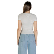 Light grey fitted short-sleeve T-shirt paired with light blue wide-leg jeans by Tommy Hilfiger Women