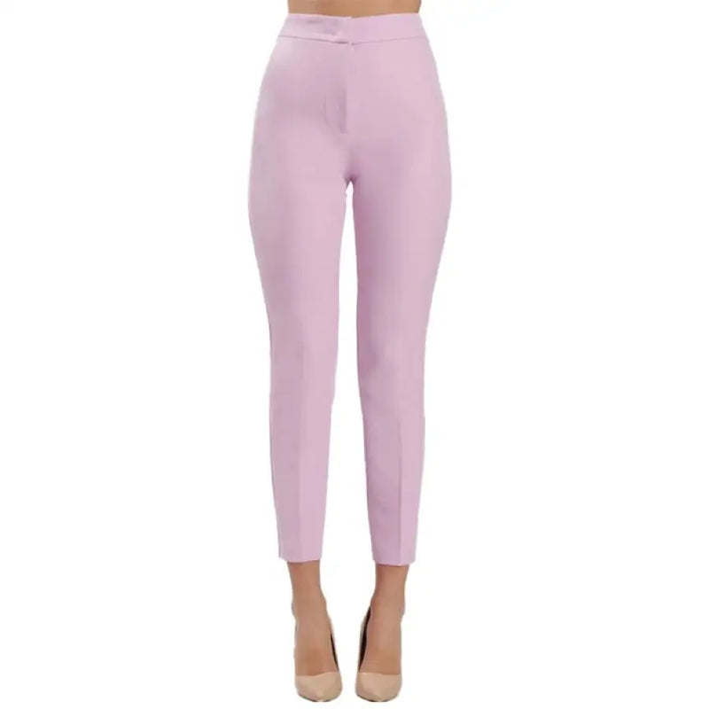 Light pink high-waisted trousers stylishly showcased for contemporary fashion