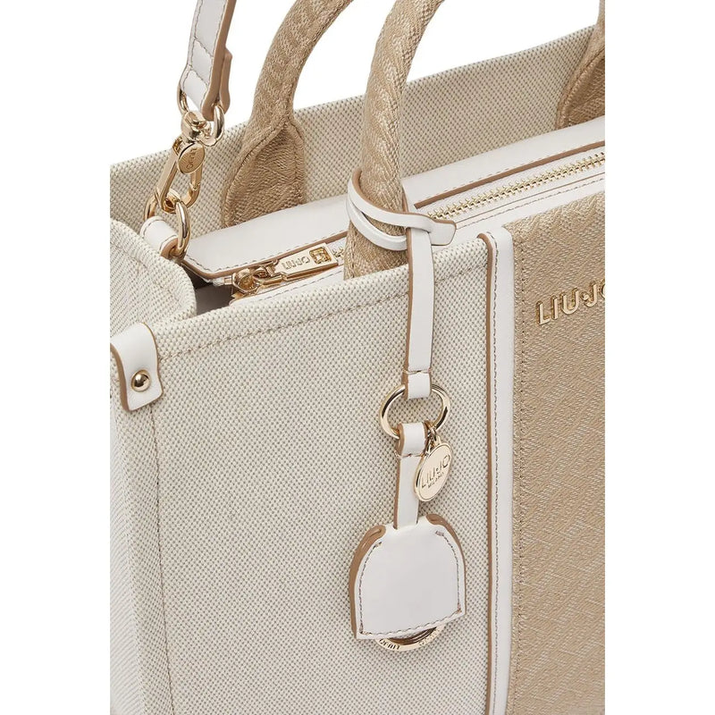 Liu Jo beige canvas tote bag with white leather trim gold-tone hardware shoulder strap and zip pocket featuring branded charm tag