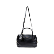 Black leather duffel-style handbag with detachable shoulder strap from Liu Jo in polyurethane