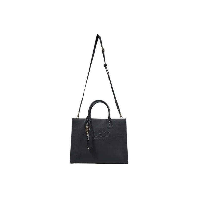 Black leather juicy couture tote bag with top handles and adjustable shoulder strap for versatile carrying