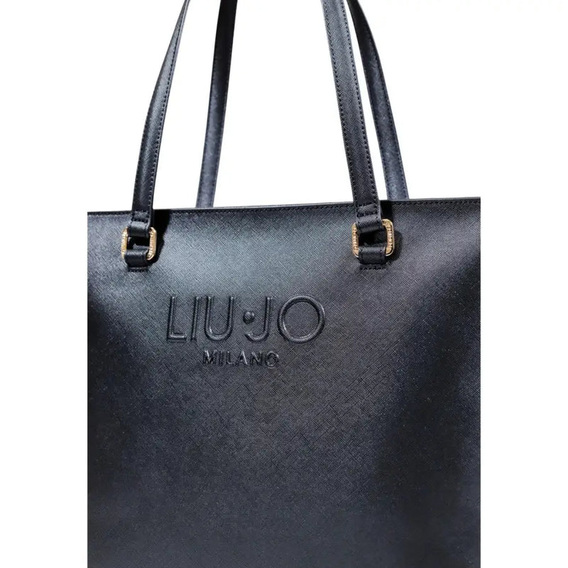 Black textured faux leather tote bag with shoulder straps and gold-tone hardware