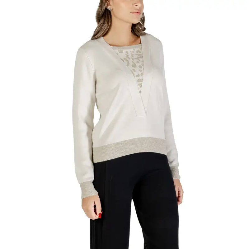 Light beige long-sleeve V-neck sweater with gray patterned undershirt for women