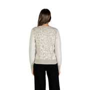 Woman wearing Liu Jo Women Beige Leopard Long Knitwear with light grey abstract pattern