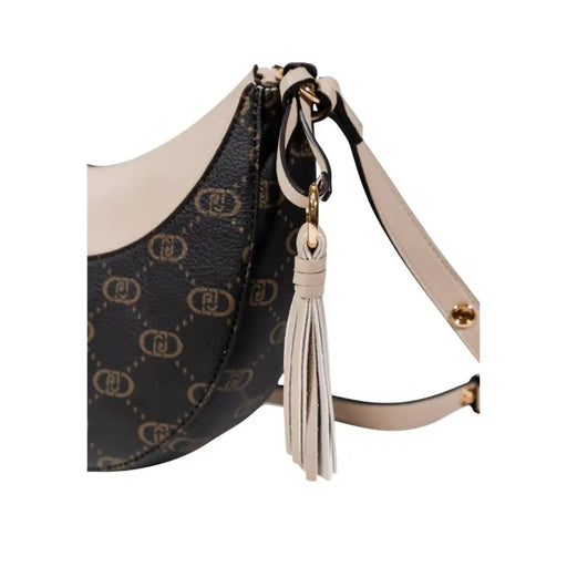 Crescent-shaped Liu Jo shoulder bag with monogram pattern, beige accents, and tassel charm