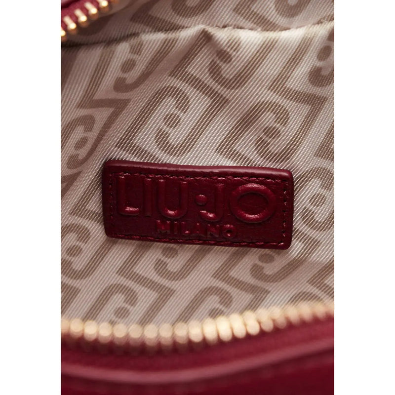 A burgundy leather brand tag embossed with liu jo milan on a liu jo women red crossbody bag polyurethane w24cm
