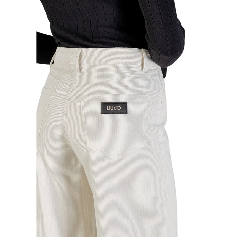 Cream-colored corduroy trousers with subtle vertical ribbed texture and black leather liu jo brand patch