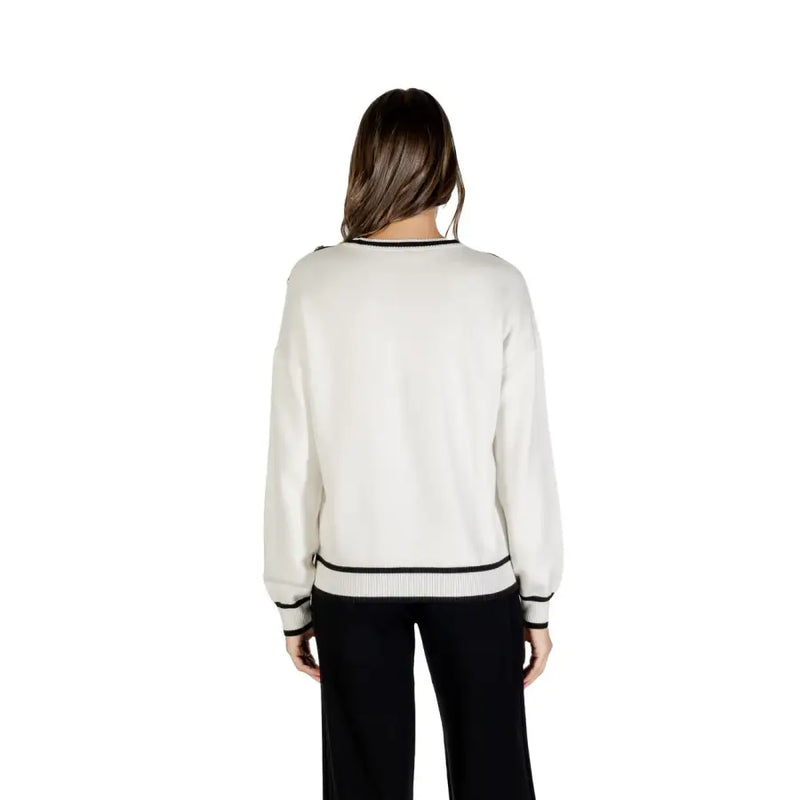 Woman wearing Liu Jo White Long Round Neck Knit Sweater with black trim