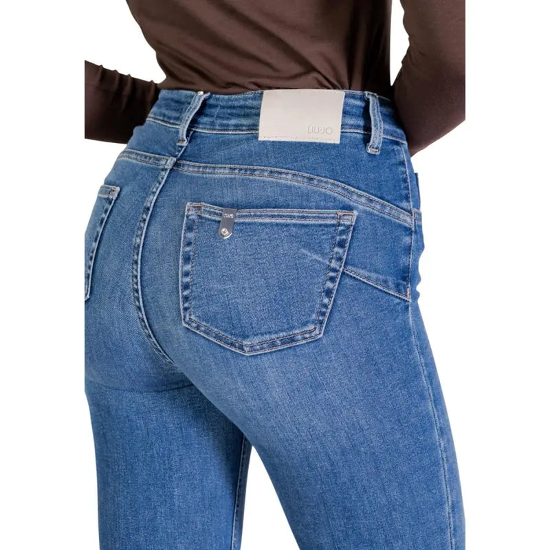 Back view of liu jo women’s blue cotton blend jeans with classic pocket design and white brand label at waistband