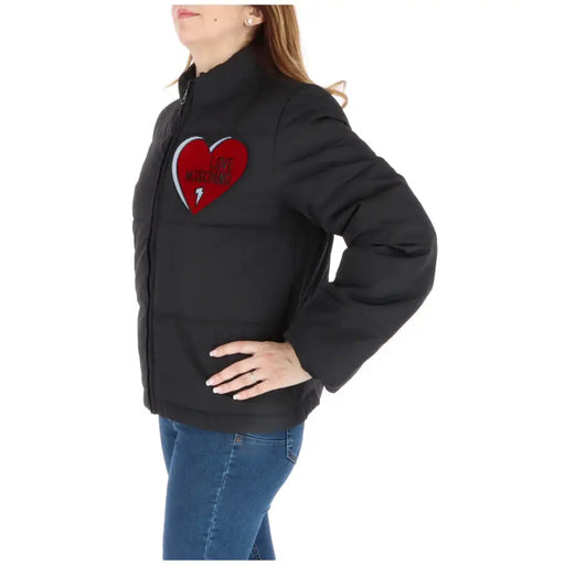 Love moschino black puffer jacket with bold red heart patch and i love this embroidery with lightning bolt symbol