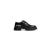Love Moschino women’s black lace-up shoe in leather and polyurethane with glossy finish and chunky sole
