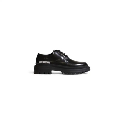 Love Moschino women’s black lace-up shoe in leather and polyurethane with glossy finish and chunky sole