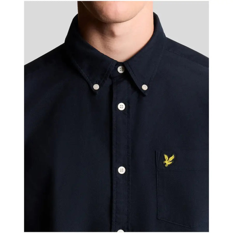 Men’s navy blue cotton long sleeve shirt with yellow eagle logo on chest pocket