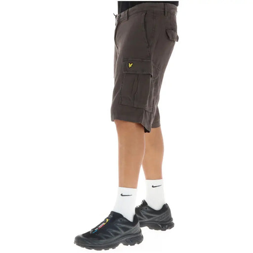 Lyle & Scott grey linen cargo shorts for men featuring multiple pockets and a yellow bird logo on the thigh