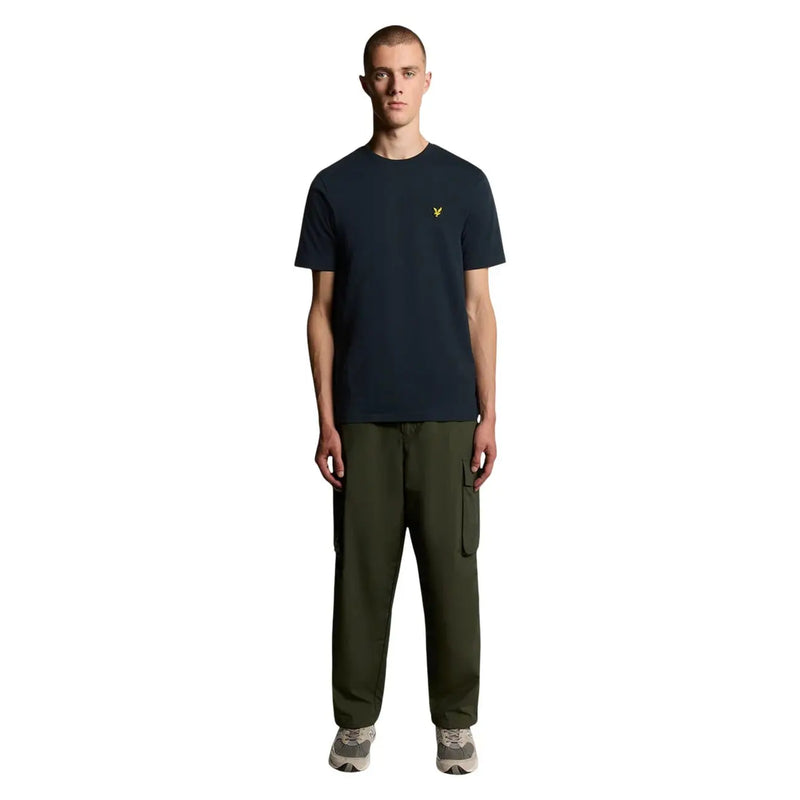 Navy blue short-sleeved cotton t-shirt with small yellow bird logo on left chest from lyle and scott men collection