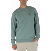 A soft sage green lyle & scott cotton crewneck sweatshirt with a small yellow bird logo on the left chest