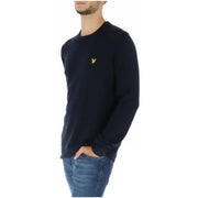 Navy blue long-sleeved crew neck knit sweater by Lyle & Scott with a small yellow embroidered bird logo on left chest