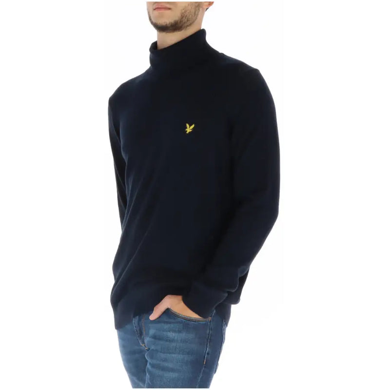 Lyle & Scott men’s black turtleneck sweater featuring a small yellow bird logo on the chest, ideal for casual wear