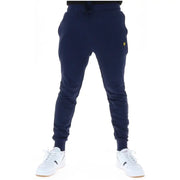 Navy blue fleece joggers with a small yellow bird logo on the thigh for casual wear by Lyle & Scott