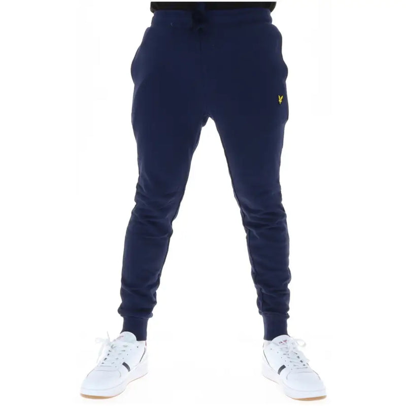 Navy blue fleece joggers with a small yellow bird logo on the thigh for casual wear by Lyle & Scott