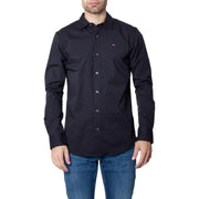 Man wearing a black button-down shirt and blue jeans displayed in the product listing