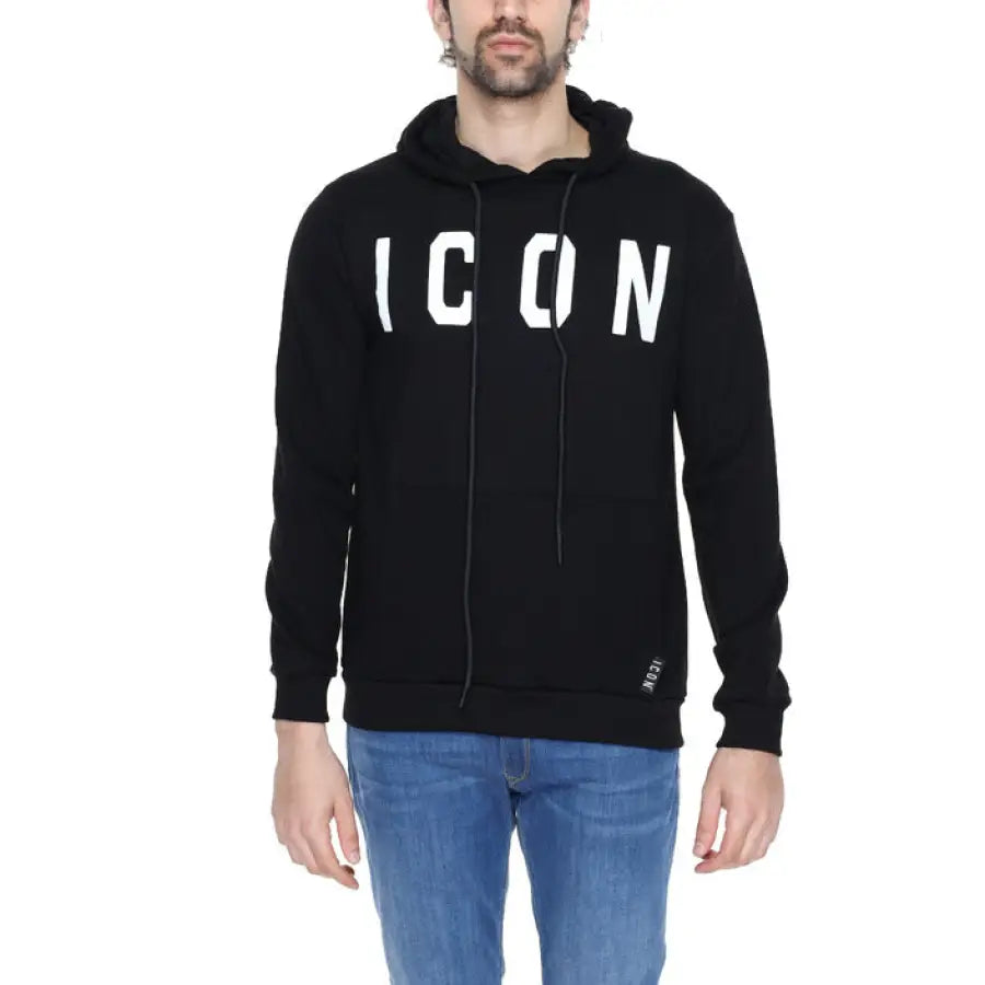 Man in Icon Men Sweatshirt sporting urban city style with ’I CAN’ text