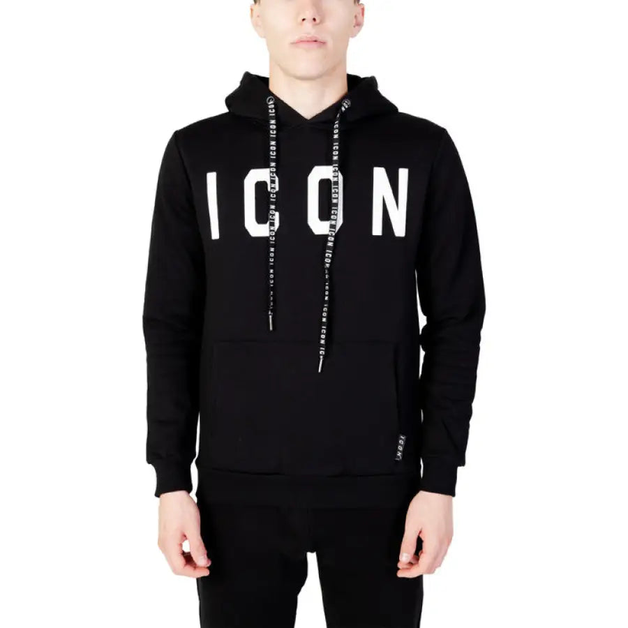 
                      
                        Man in Icon black hoodie, perfect for urban style clothing and city fashion
                      
                    