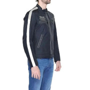 Man in Blauer urban style clothing, black jacket with white logo, for city fashion