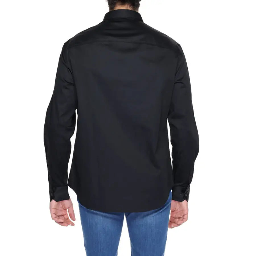 Armani Exchange Men Shirt model in black shirt and jeans by Exchange Armani Exchange