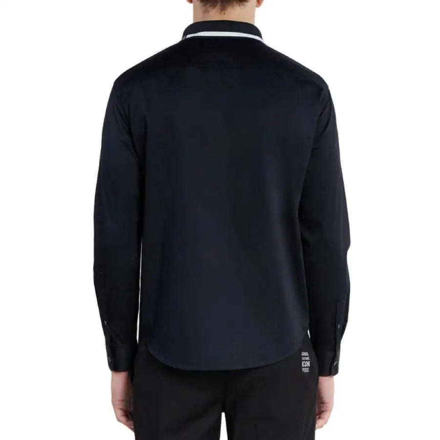 Man modeling Armani Exchange men shirt in black pants for Armani Exchange collection